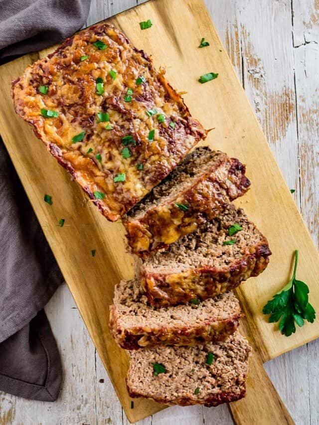 meatloaf sliced on a wooden serving board