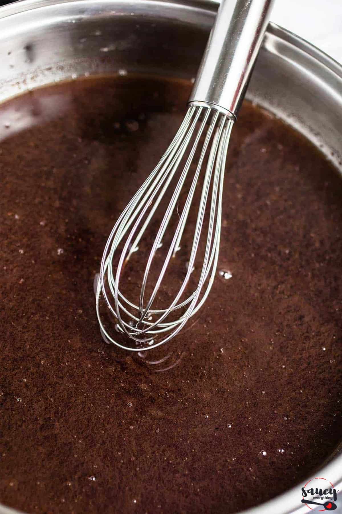 Complete au jus in pan with whisk