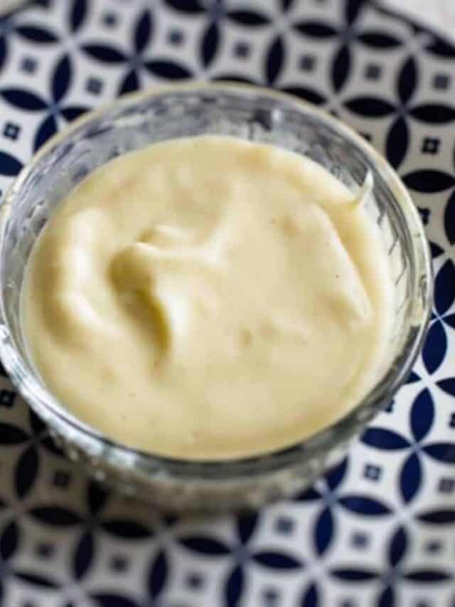 Cheese sauce in a glass bowl