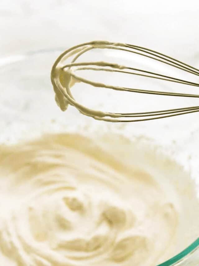Whipped cream in a bowl after mixing