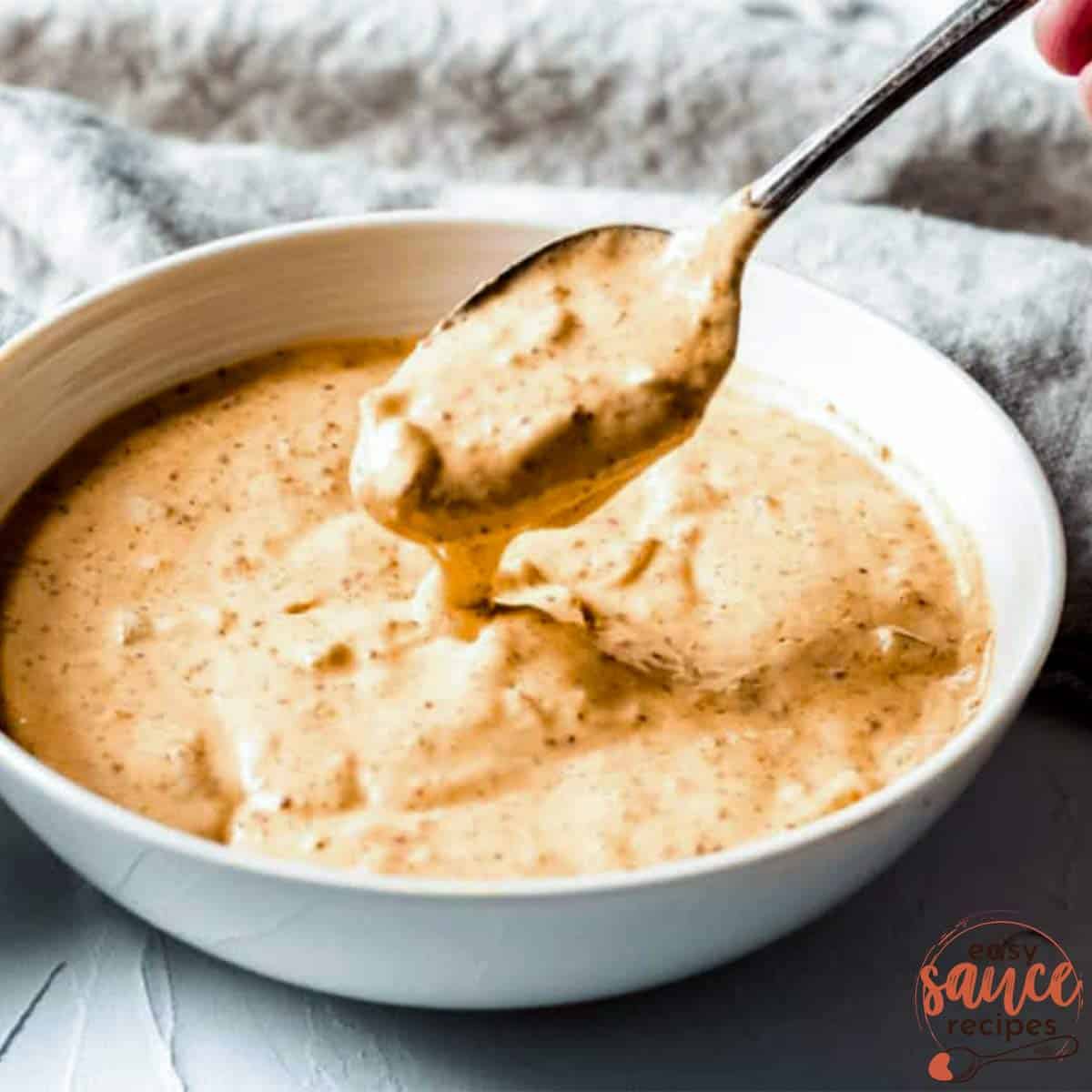 remoulade sauce in a bowl with a spoon