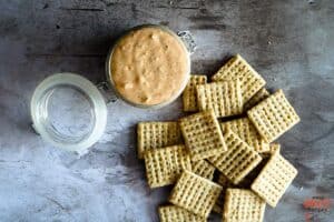 remoulade sauce in a jar next to crackers