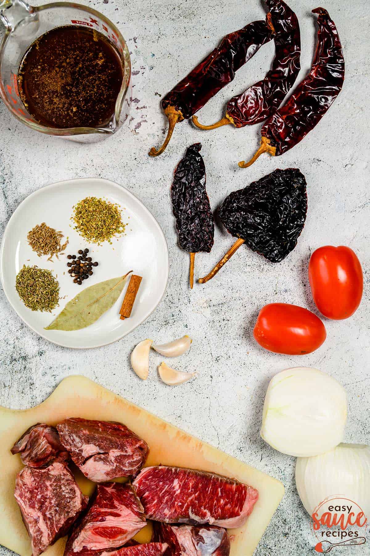 ingredients to make birria on a table