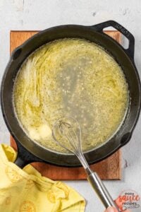 melting butter into pan for lemon garlic butter sauce