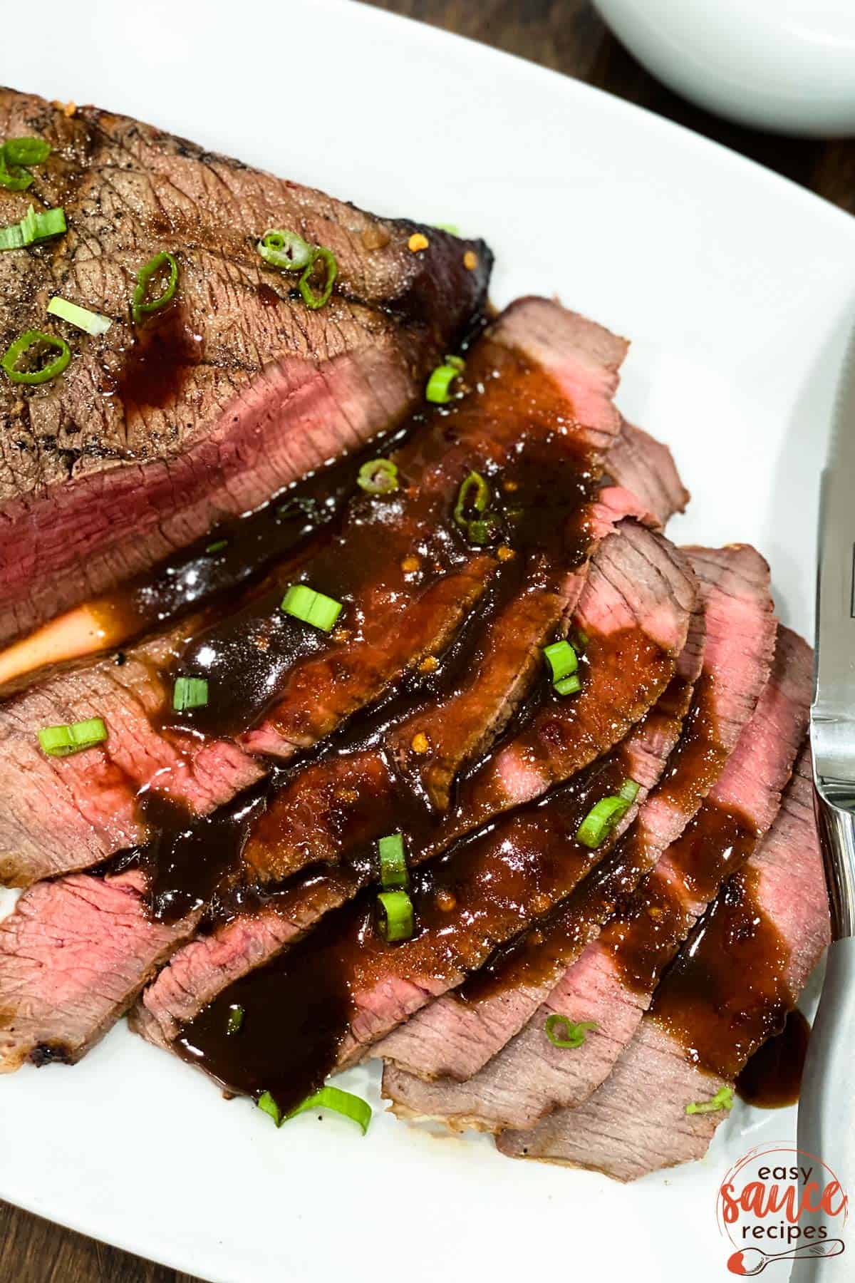Strips of london broil with marinade
