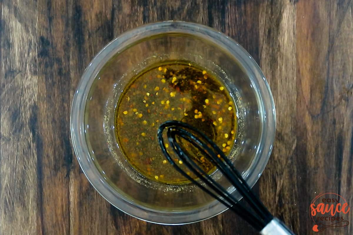 Mixing london broil marinade with whisk