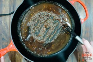 Making london broil marinade into a sauce in a skillet