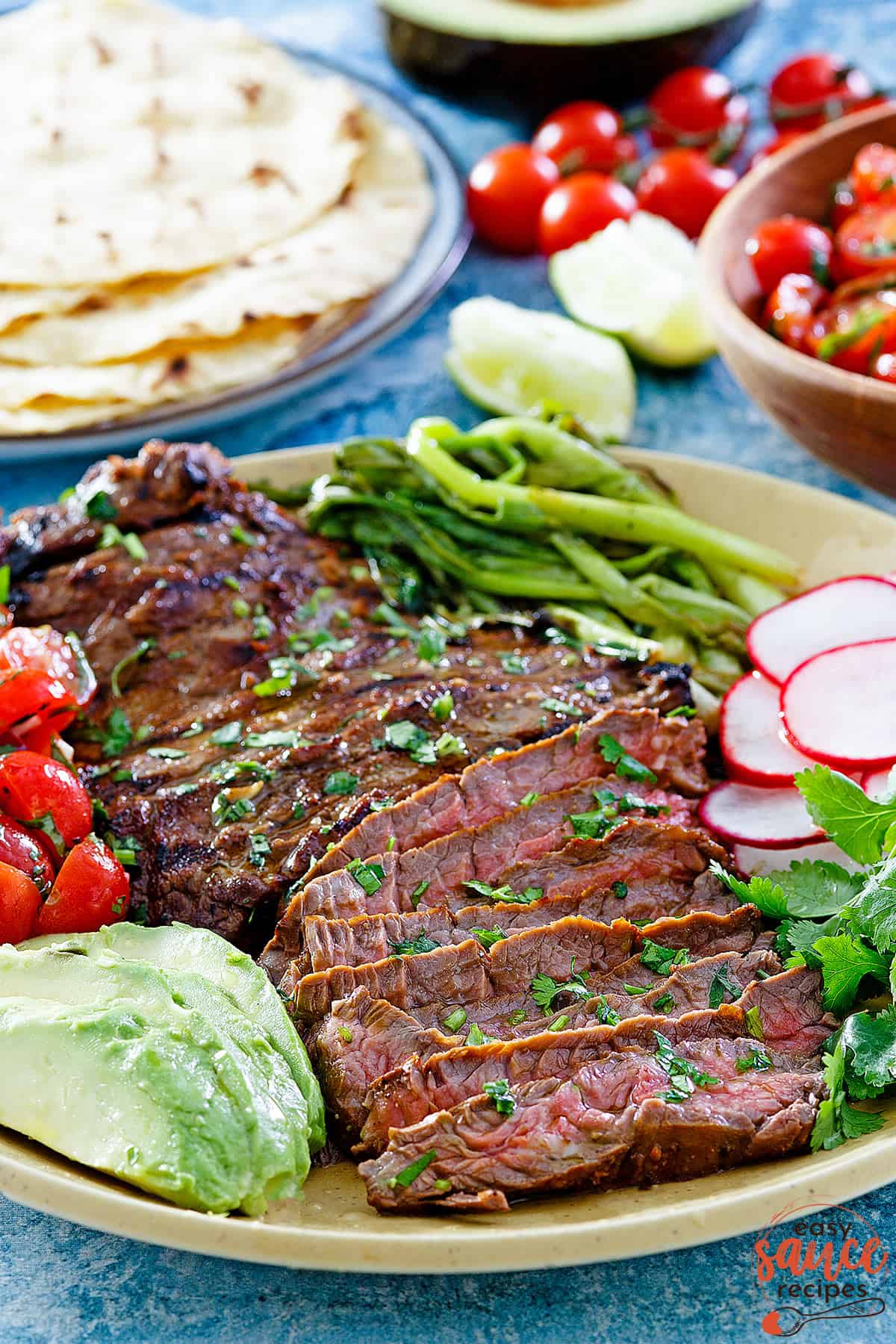 Carne asada marinated beef resting on a plate