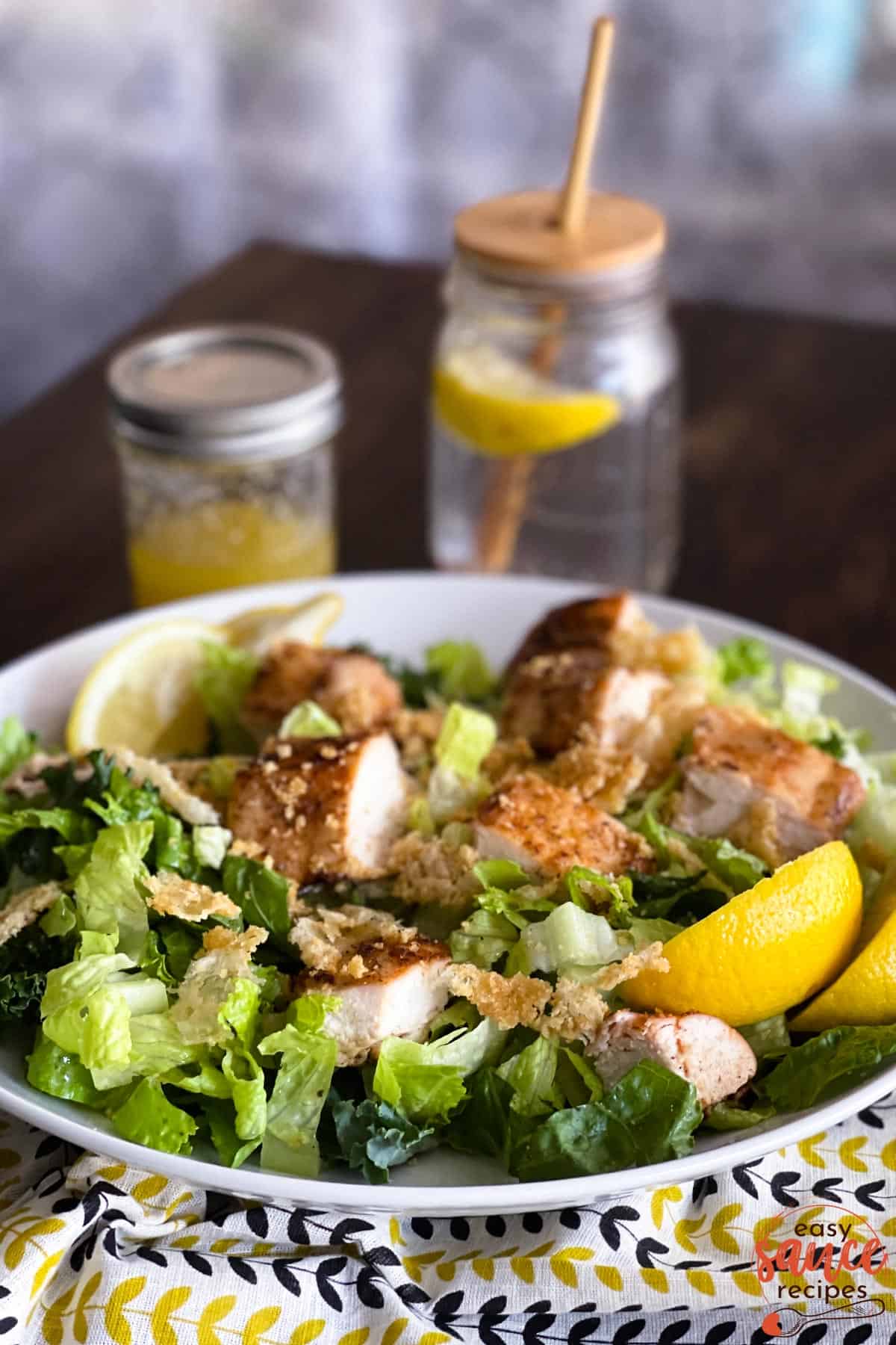 caesar salad with lemon vinaigrette on a plate