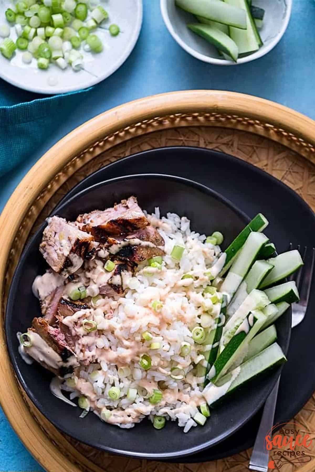 plate of tuna and rice with yum yum sauce
