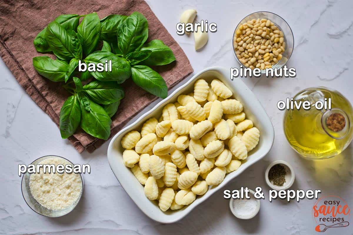 Ingredients to make pesto with labels