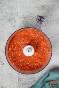 harissa sauce in a food processor after being blended.
