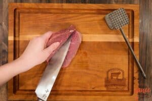 slicing a steak to butterfly it