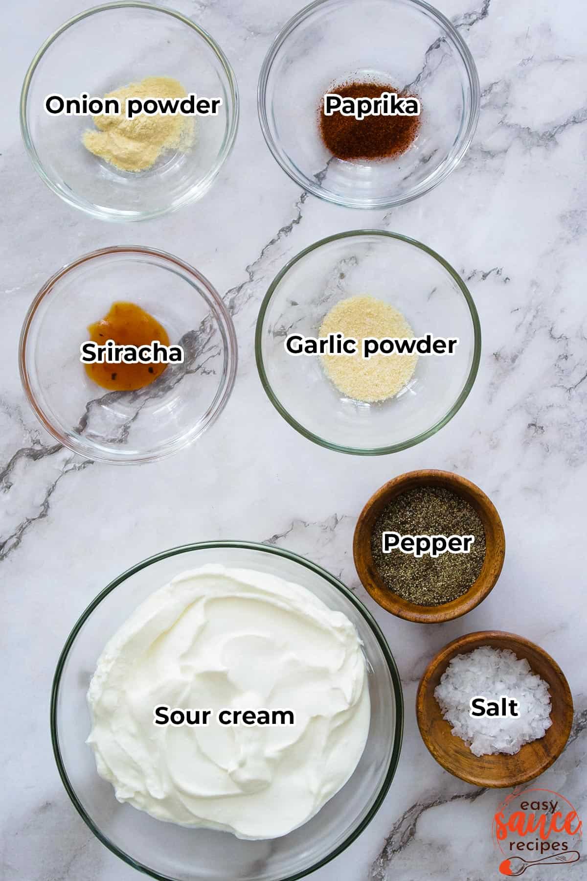 the ingredients for sweet potato dipping sauce in separate bowls with labels