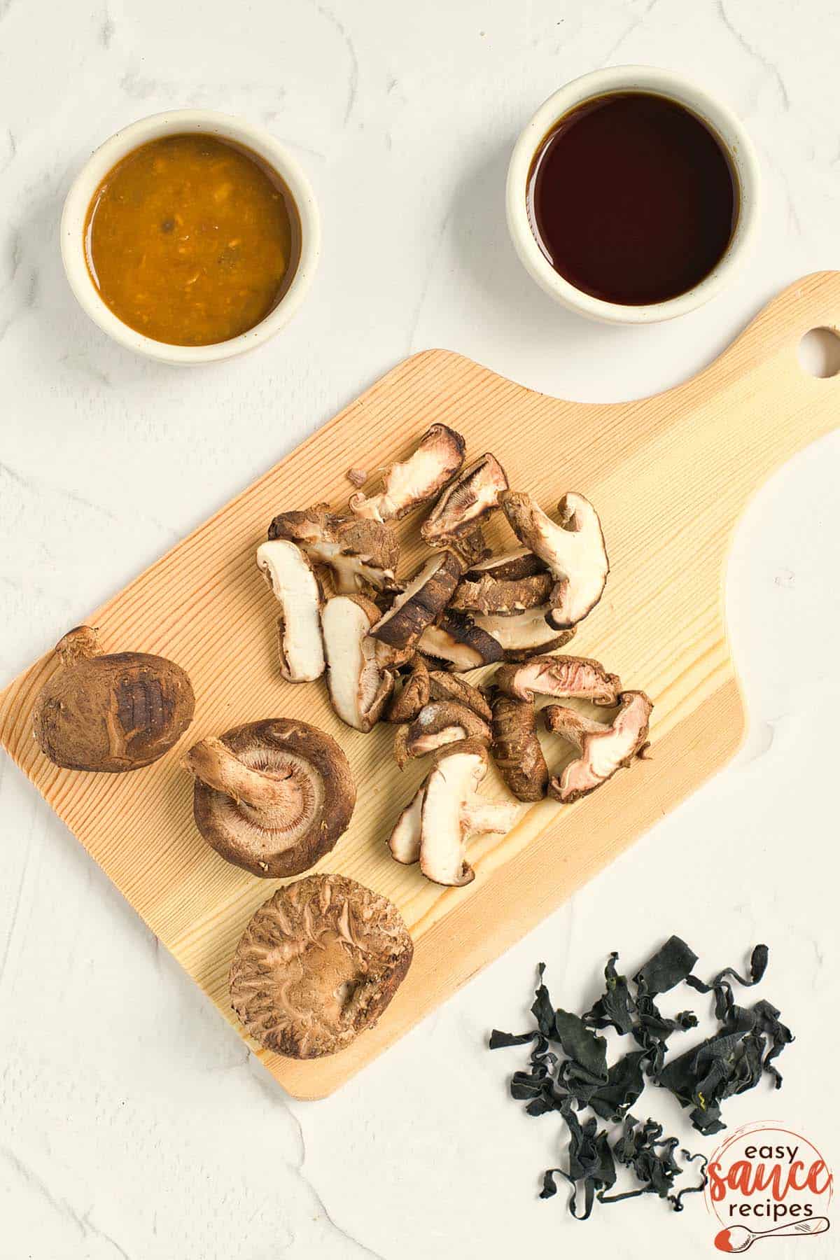 sliced shiitake mushrooms on a cutting board