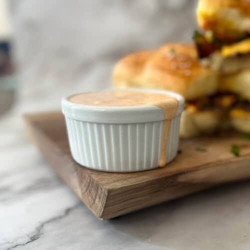 close up of burger sauce in a white dish