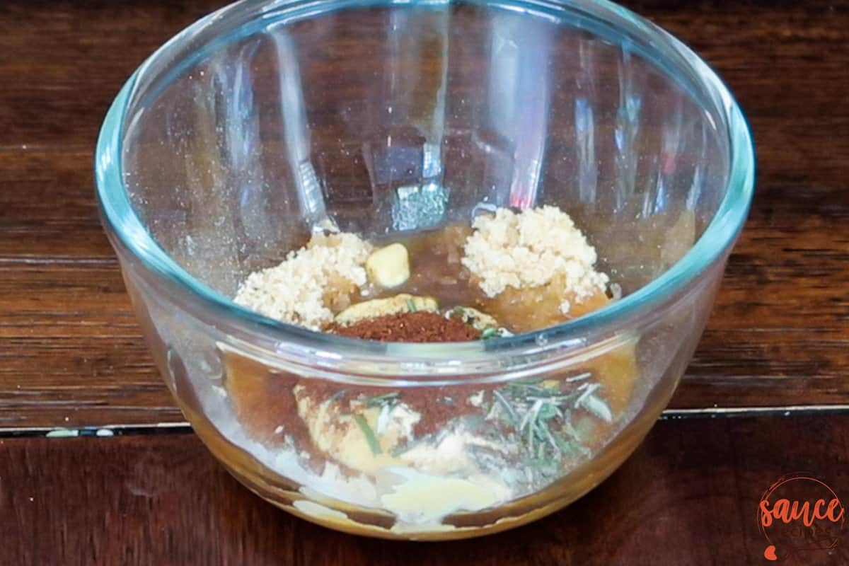 all the ingredients of ham steak glaze in a glass bowl before being mixed