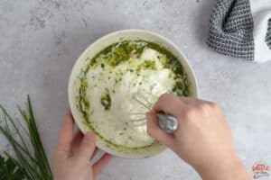 mixing ranch in a bowl