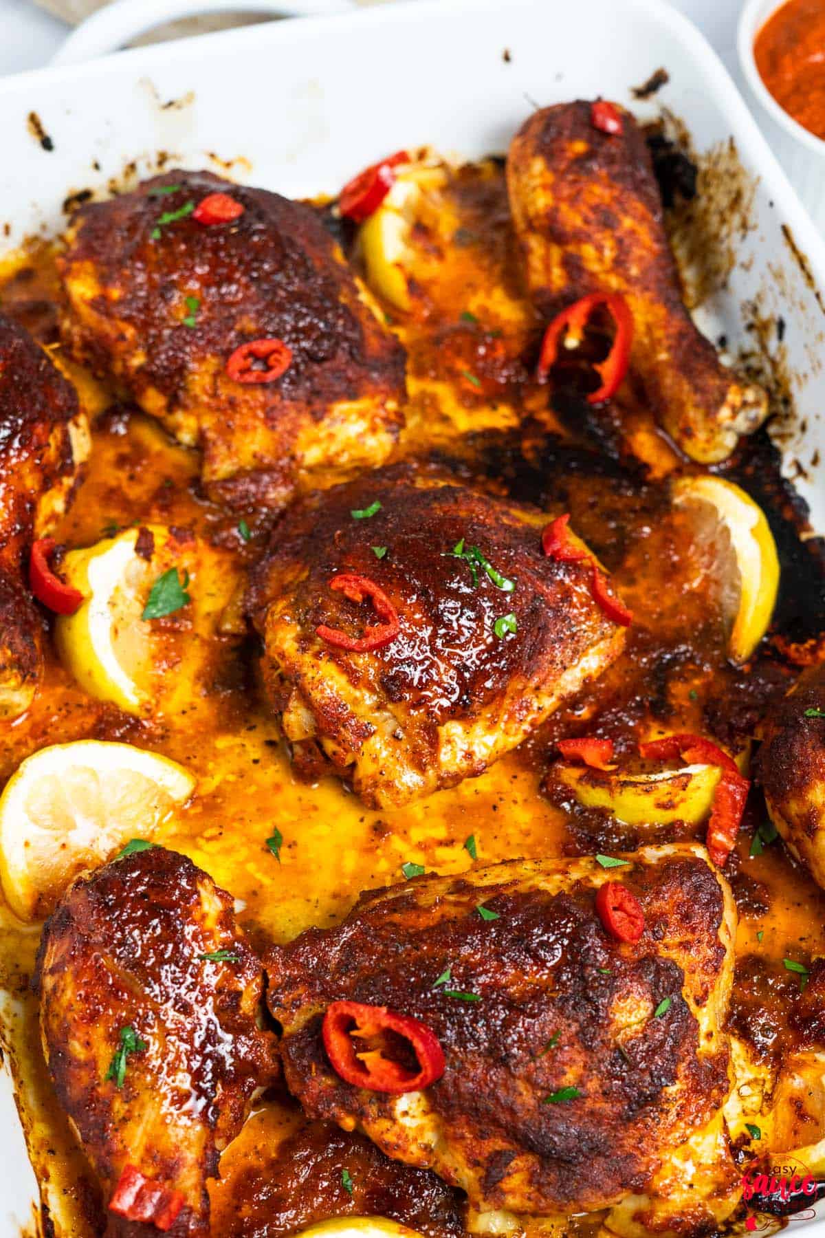 peri peri sauce over chicken thighs