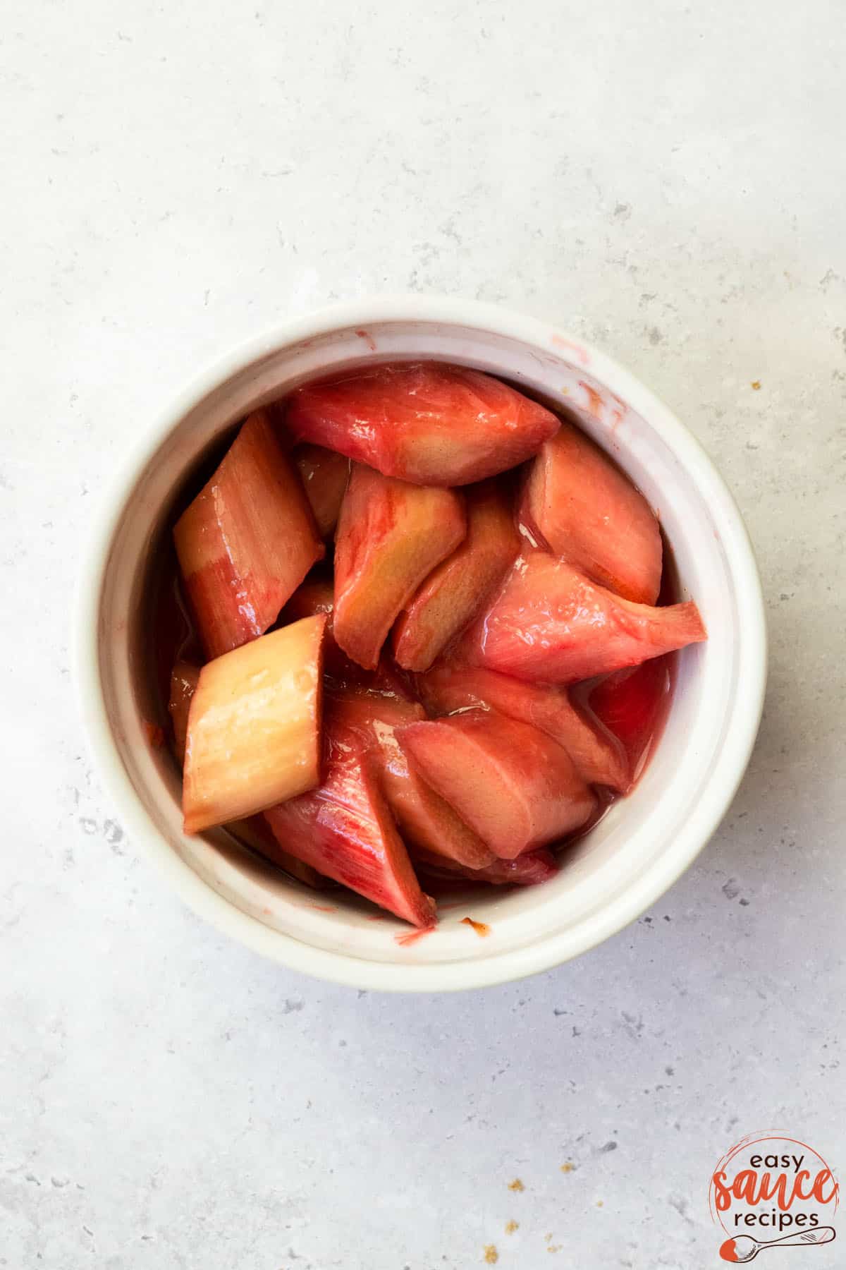 a dish of stewed rhubarb on a white counter