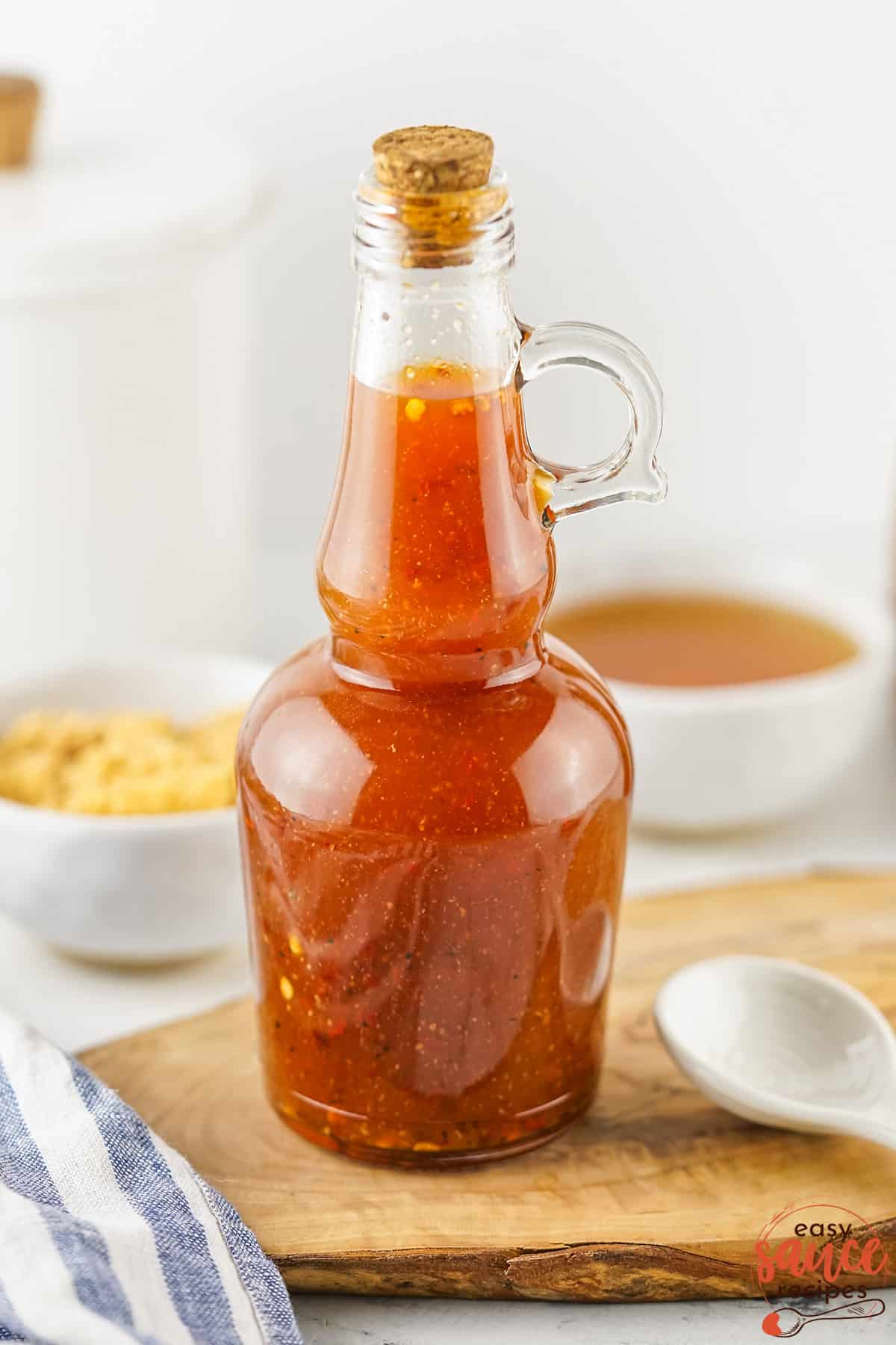 a corked bottle of homemade vinegar BBQ sauce